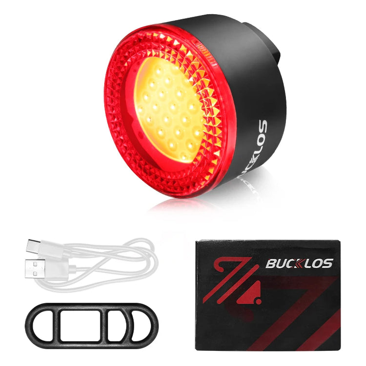 Bicycle tail light with USB cable and charger on a white background
