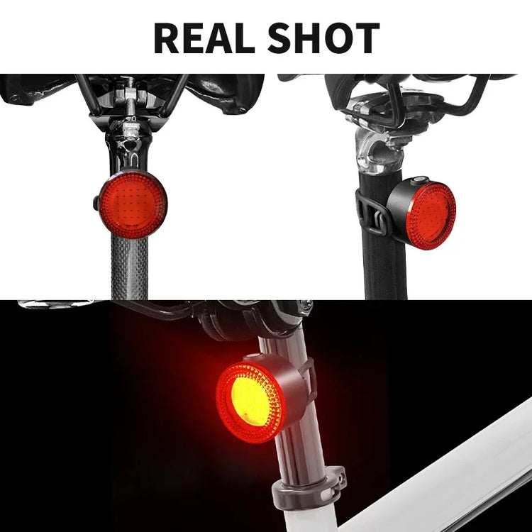 Bicycle tail light attachment with red lens on a white background