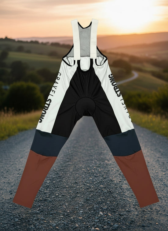 Color-blocked bib overalls with text on a gray background