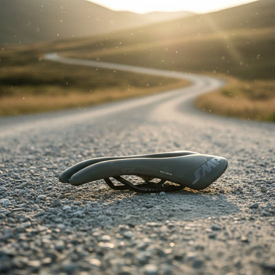 Gray bicycle saddle with Selle SMP logo on a white background