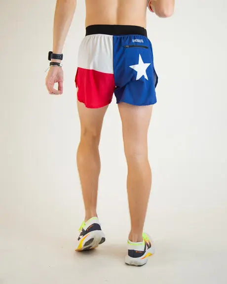 Person wearing a flag-themed athletic shorts with a white star on a plain background