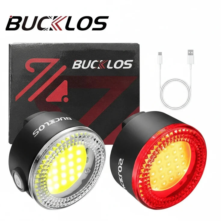 Two bicycle lights with a USB cable and packaging displaying the BUCKLOS brand.